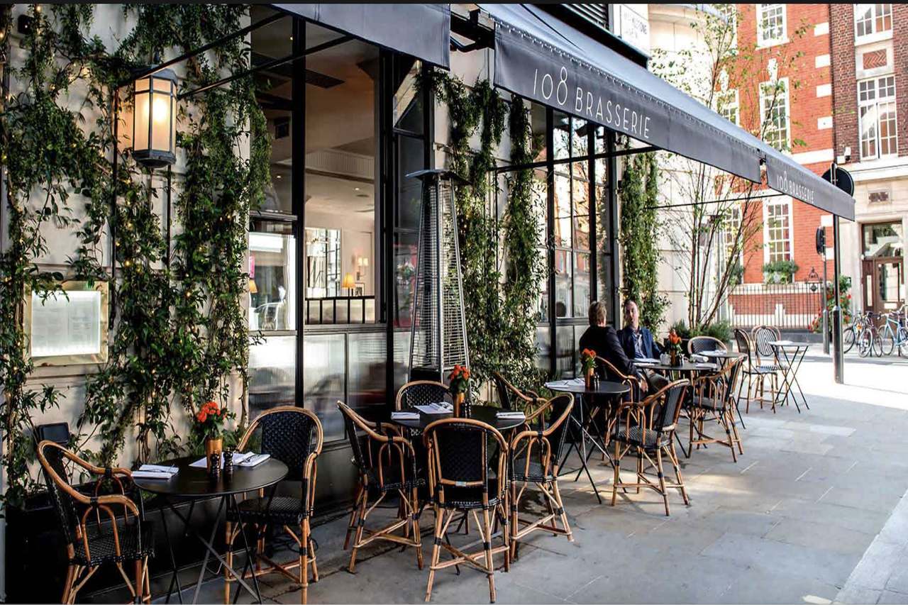 108 restaurant wraps around The Marylebone Hotel