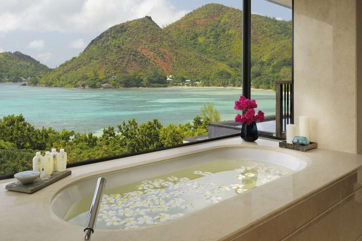 Bath time at Raffles Praslin in the Seychelles with views over the ocean