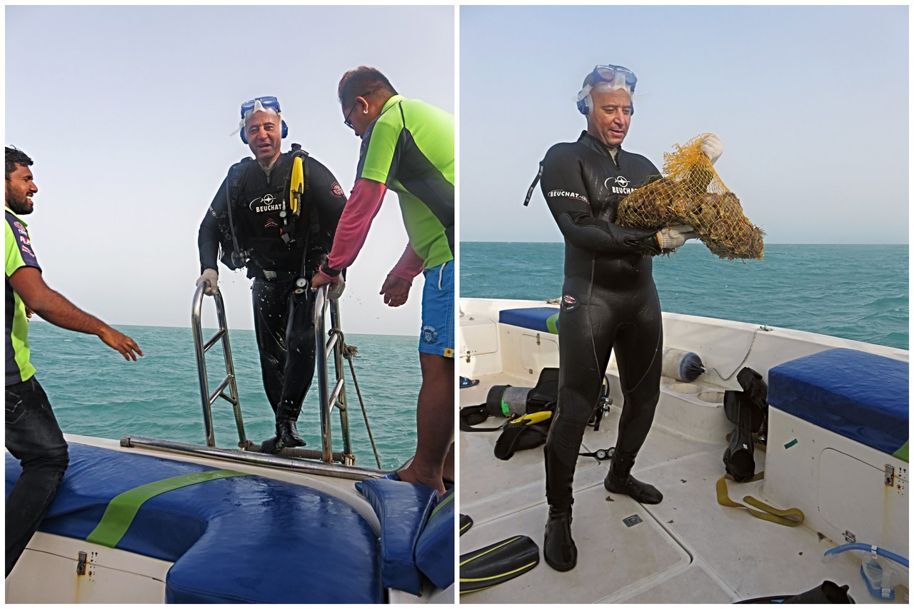 Ahmed returns to boat with oyster haul after dive c. Ramy Salame