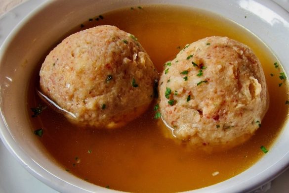 Canederli in Broth – a Traditional Dish in the Restaurants of Madonna di Campiglio, Italy - a Traditional Dish in the Restaurants of Madonna di Campiglio, Italy