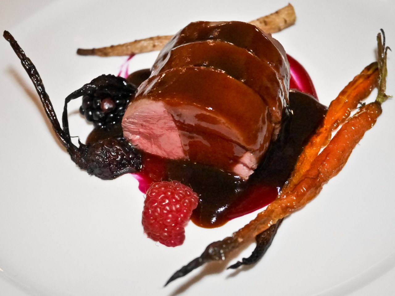 Carlton Saddle of deer with berries, carrot, parsnip and chocolate sauce