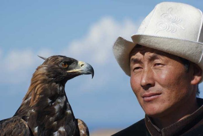 Central Asia - Eagle hunter in Kyrgyzstan Central Asia - Eagle hunter in Kyrgyzstan