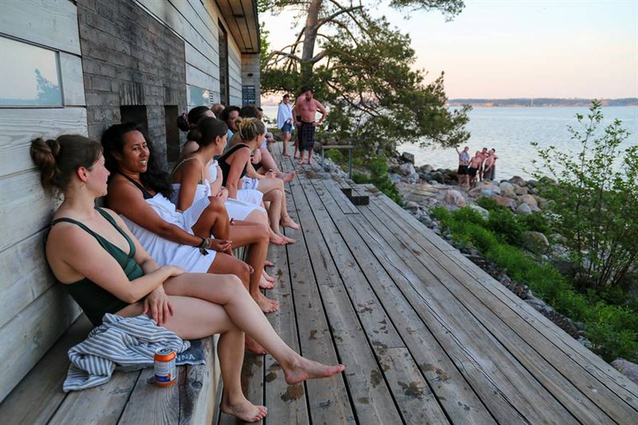 Cooling off between sauna sessions on Lonna Island. Photo: Leena Karppinen, Helsinki Partners