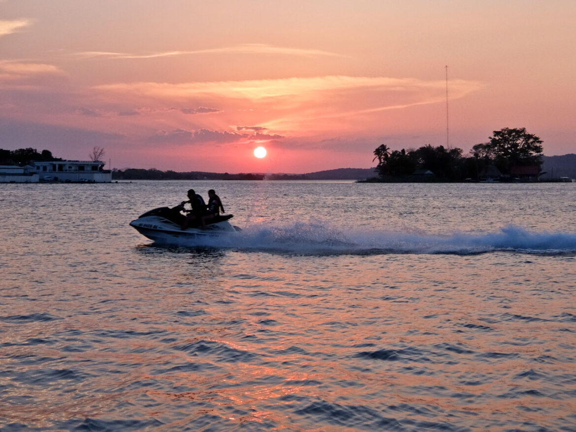Flores Sunset w jetski is one of the best places to visit in Guatemala