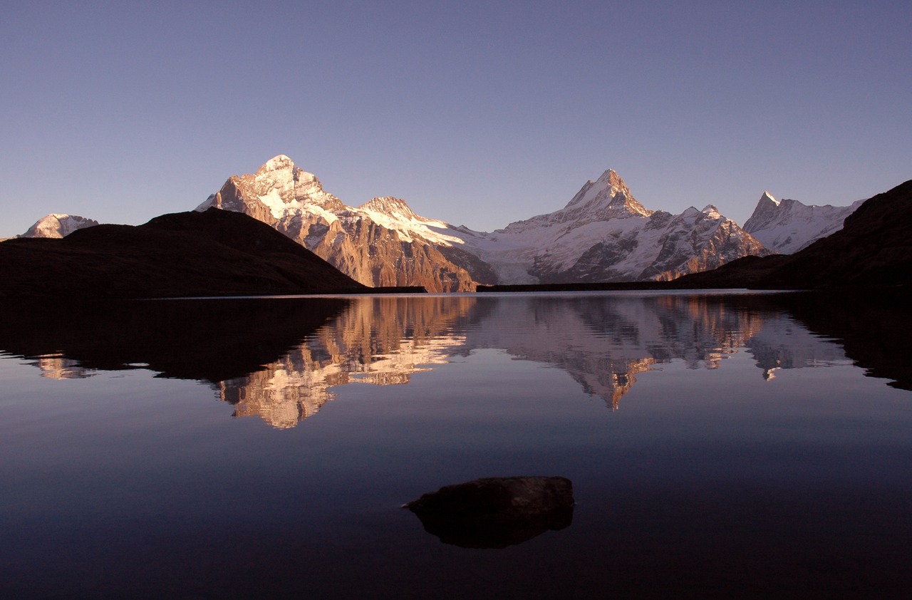 Lake Bachalpsee in the sunset with Wetterhorn and Schreckhorn. c. Jungfrau Region 