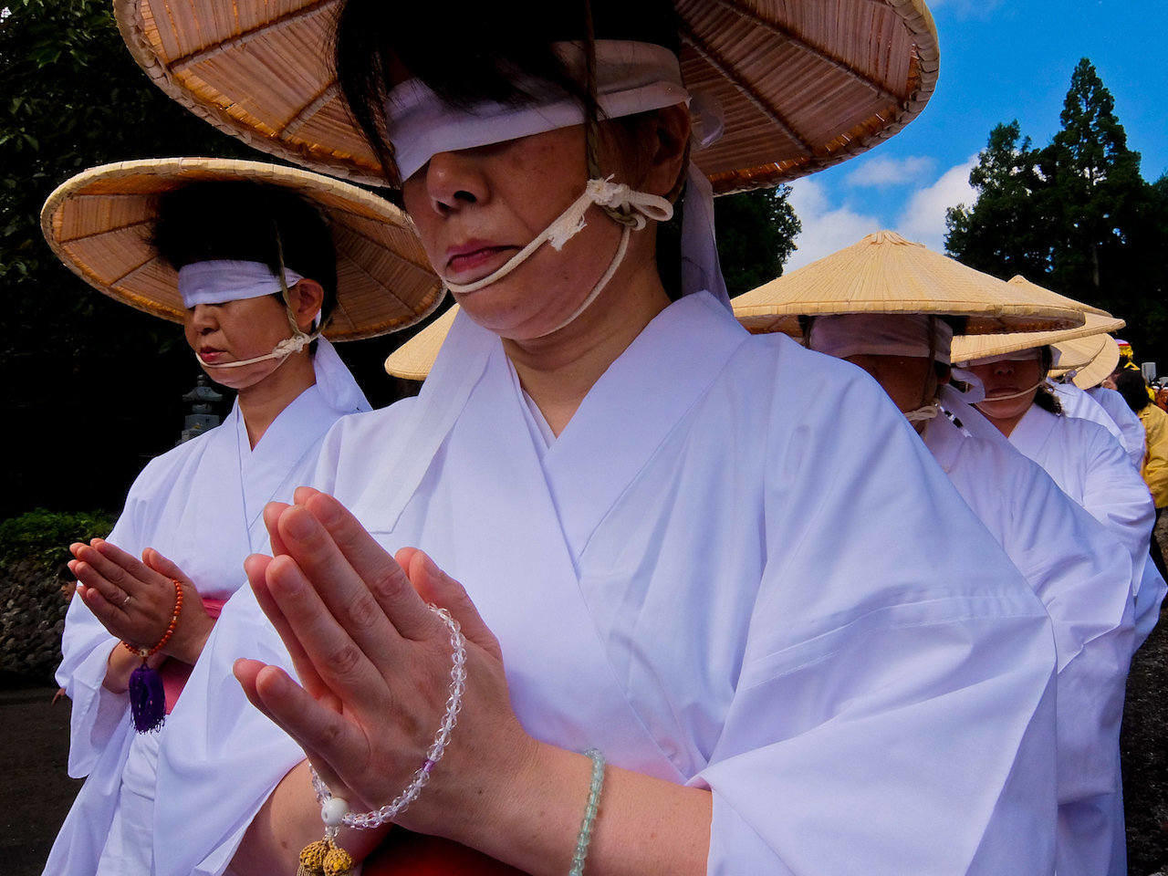 blindfolded women in graveyard