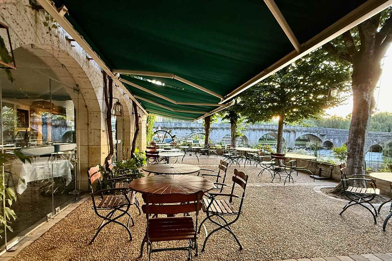 Terrace of Moulin de l’Abbaye Restaurant in Brantôme, the Dordogne