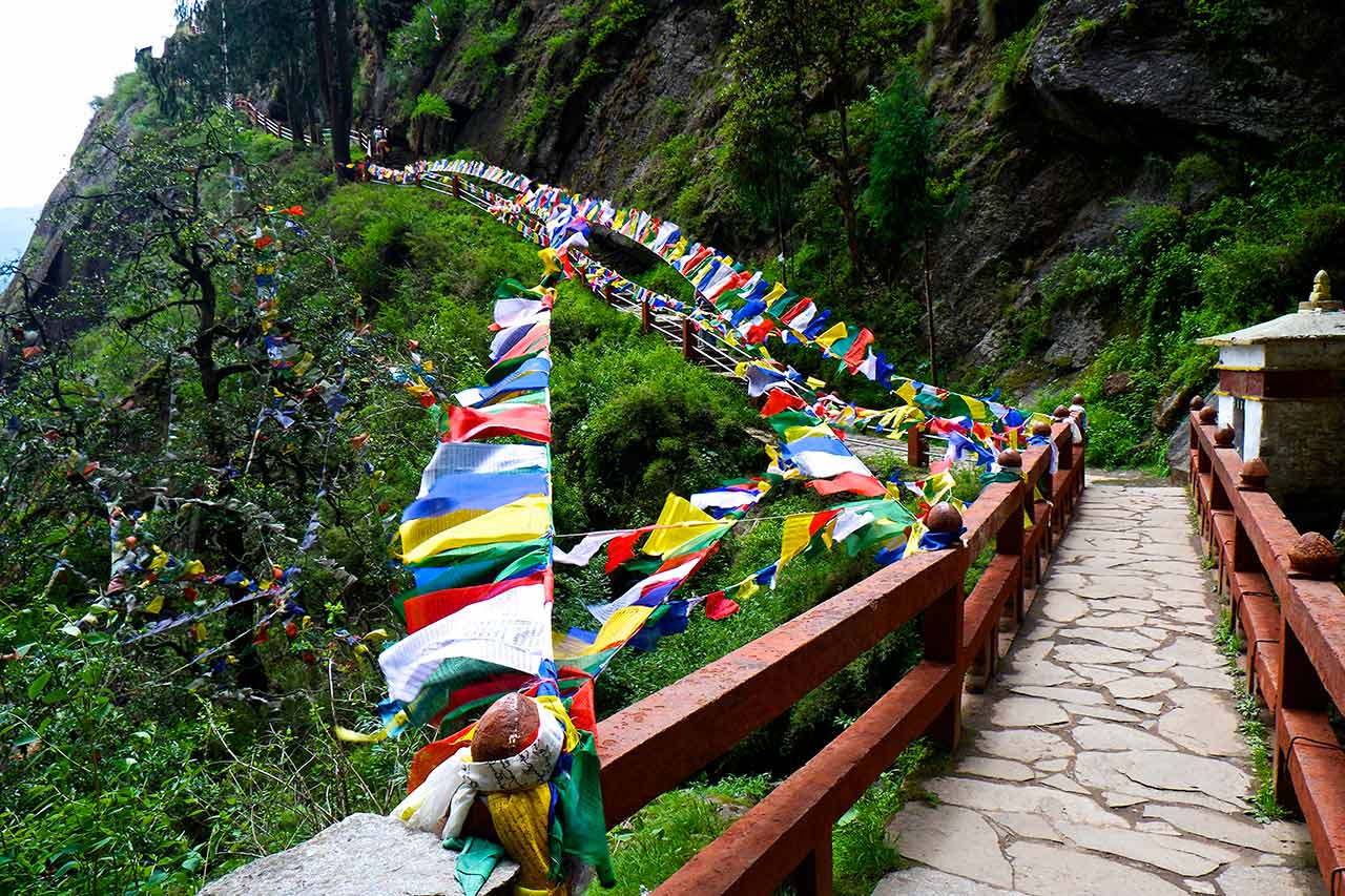 The final steps to Tiger's Nest festooned with prayer flags