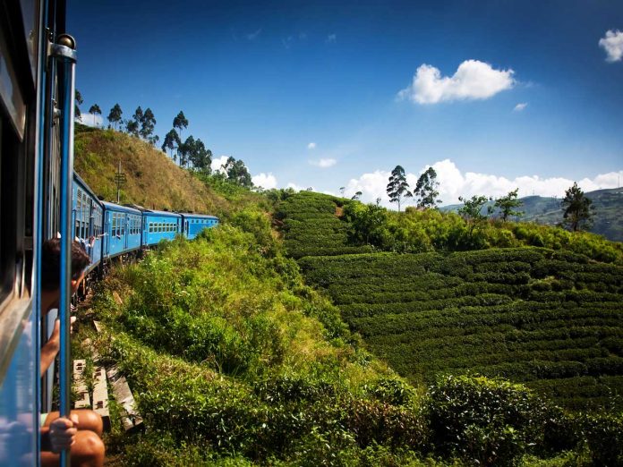Train from Nuwara Eliya to Kandy through the tea plantations in the highlands Train from Nuwara Eliya to Kandy through the tea plantations in the highlands