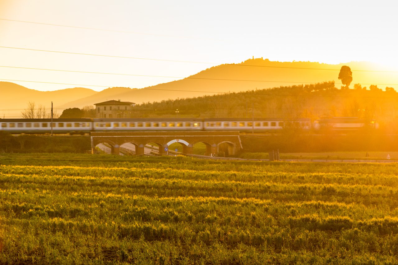 Train over bridge in Tuscany, Italy