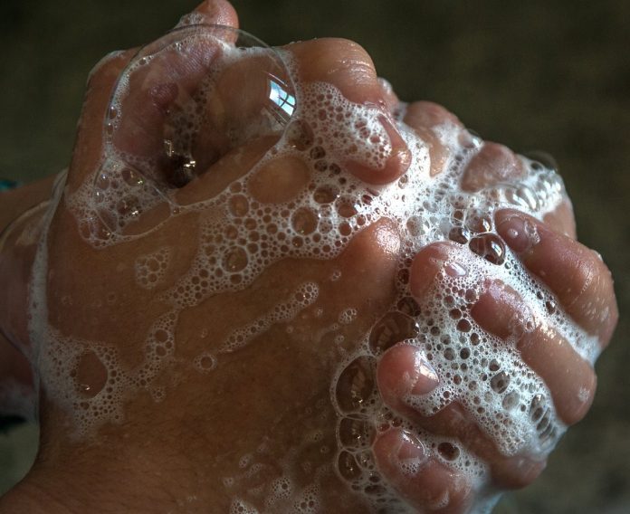 Washing hands regularly Hand washing