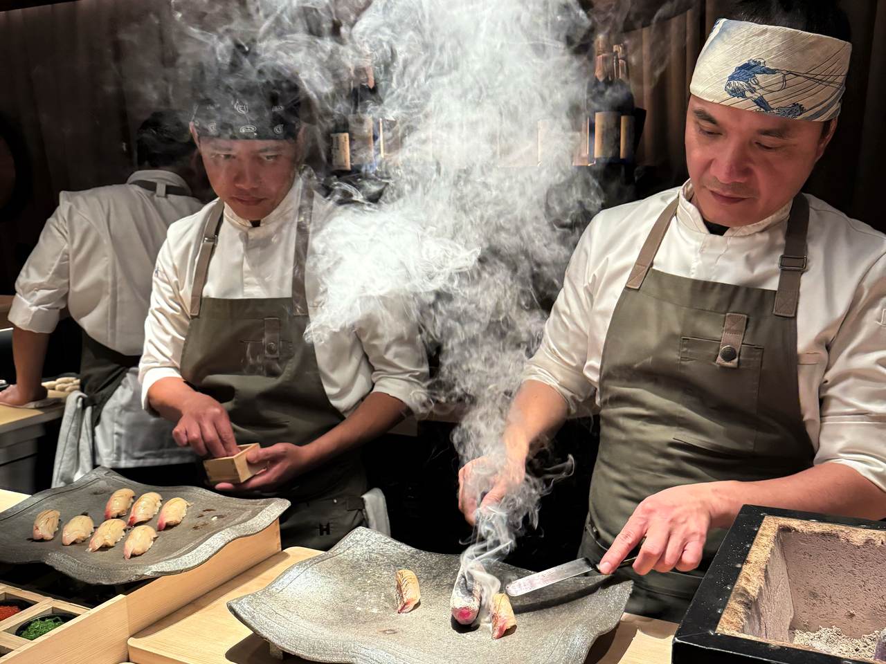 French sea bream seared with white hot, 370 Celsius binchotan charcoal Luna Omakase