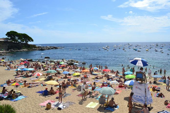 crowded sandy beach crowded sandy beach