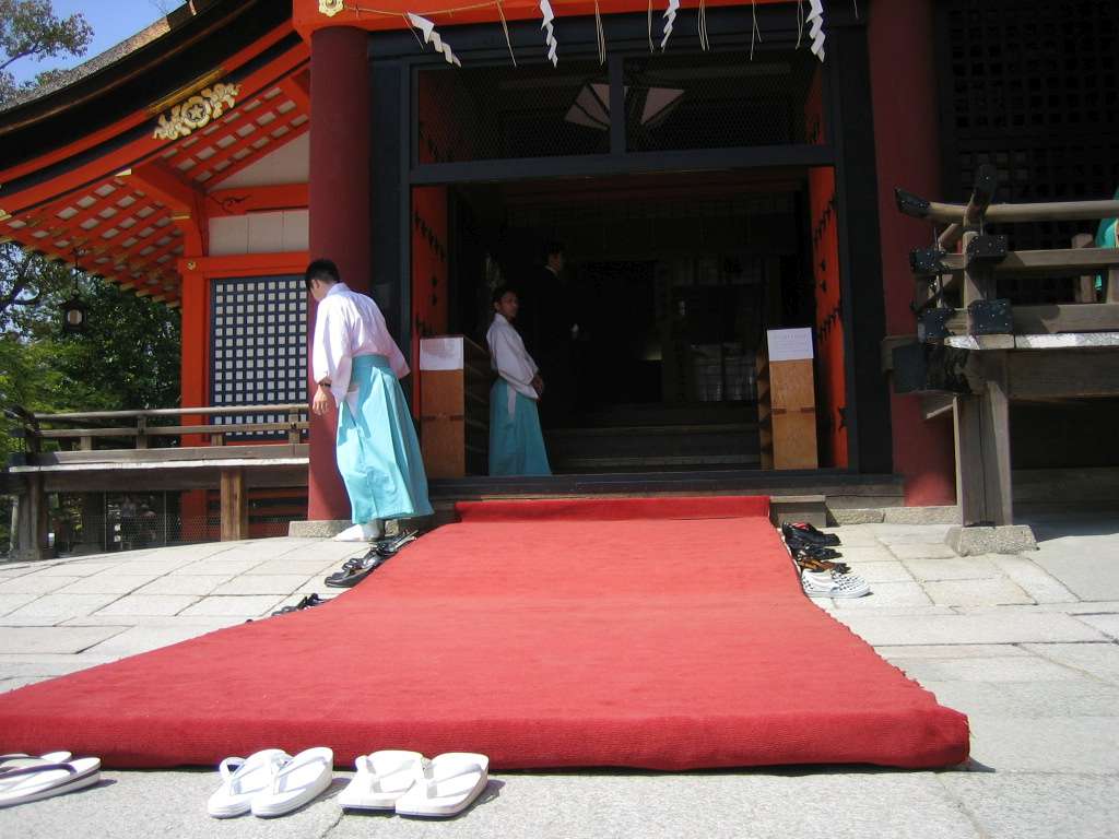 shoes in front of Japanese temple