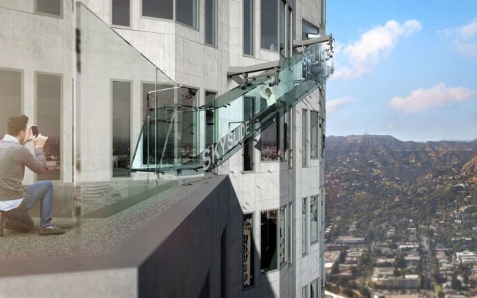 The Skyslide is forty-six feet long, 4 feet wide and made entirely with one and one quarter inches thick glass. The Skyslide is forty-six feet long, 4 feet wide and made entirely with one and one quarter inches thick glass.