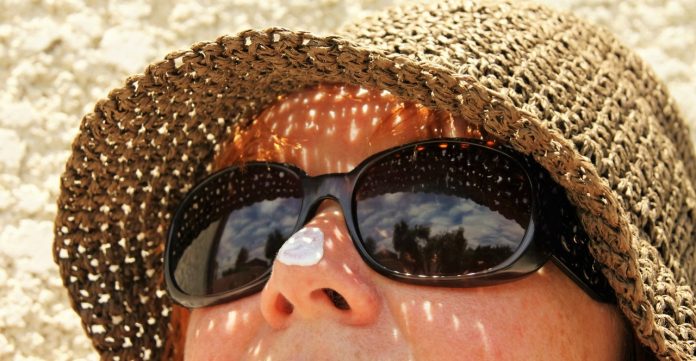 sunblock suncream sunglasses hat sunblock suncream sunglasses hat