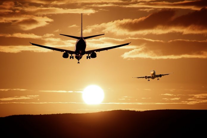 two aircraft at sunset two aircraft at sunset