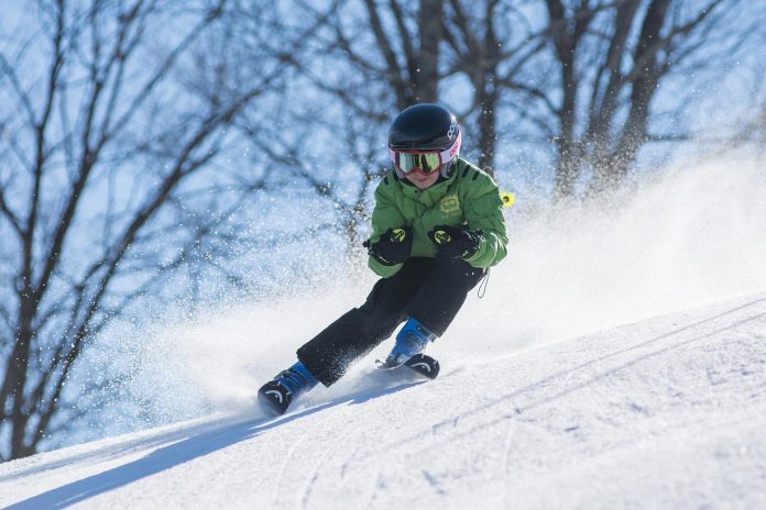 young boy skiing young boy skiing